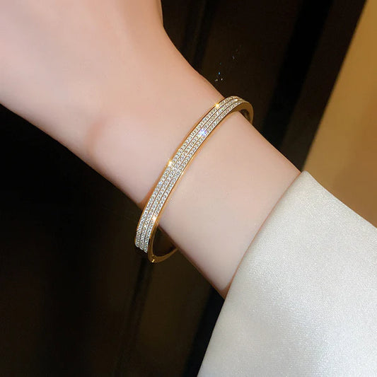 Stainless Steel Gold Plated Triple Lines American Diamond Contemporary Anti-Tarnish Bracelet For Women