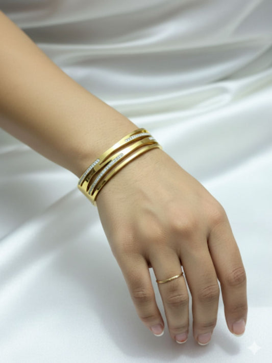 18 Karat Gold Plated Wave Bangle " A Wave of Shine. A Symbol of Style"