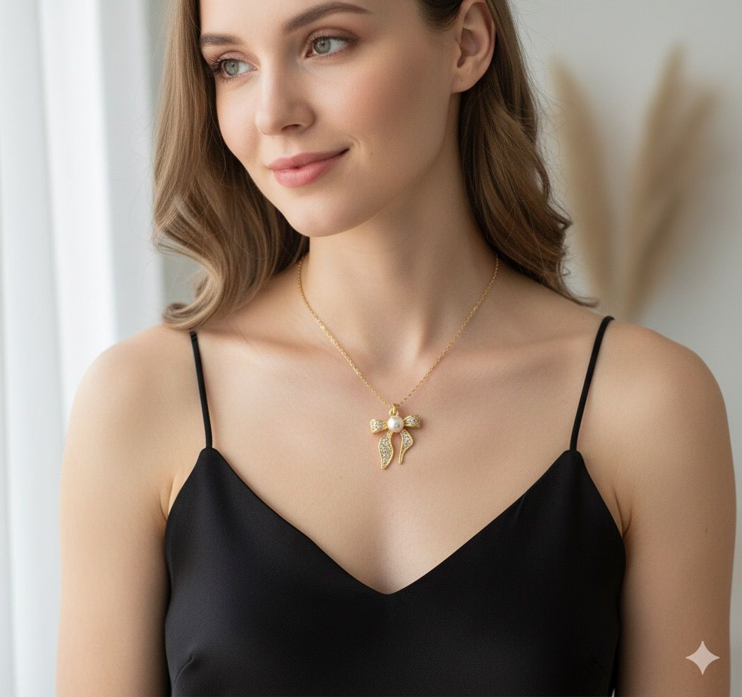 18 Karat Gold Plated Bow Knot Pendant with Pearl Drop