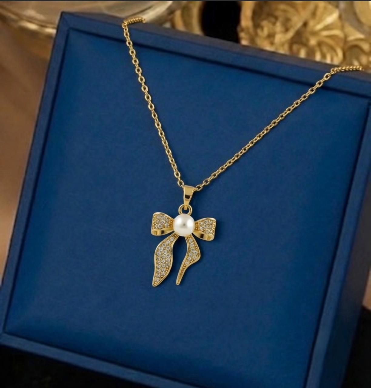 Bow Knot Pendant with Pearl Drop